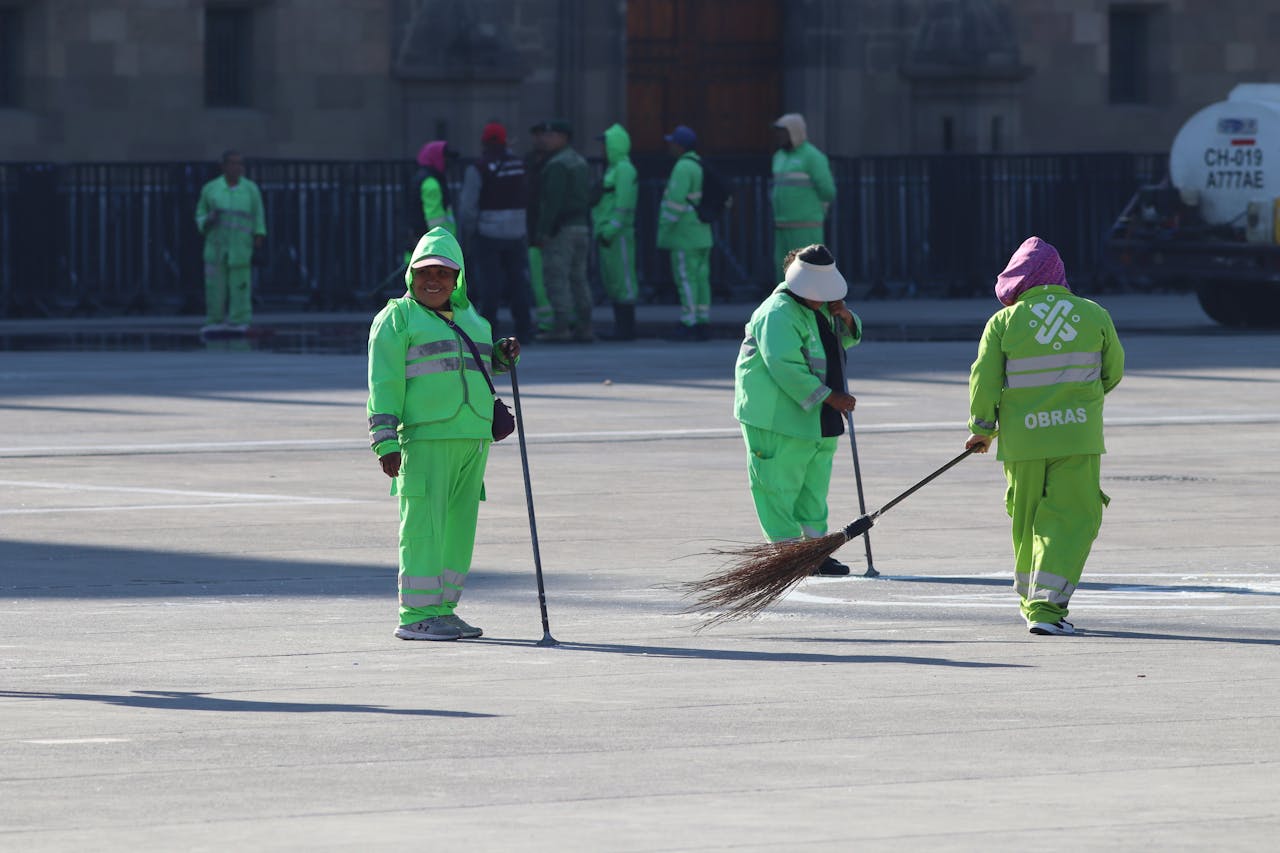 street cleaners in mexico city s public square 31188479